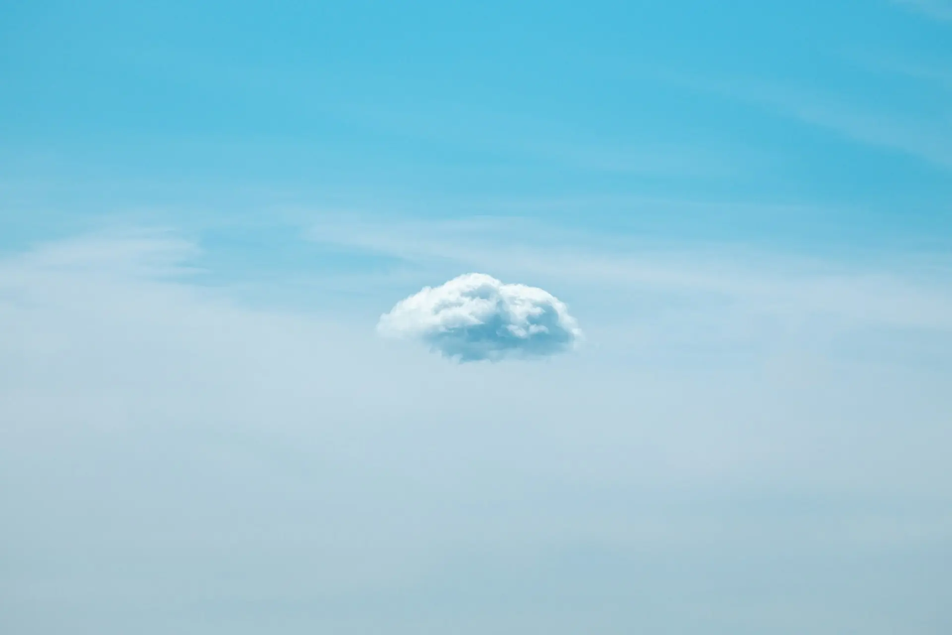 A single cloud by Parrish Freeman on Unsplash